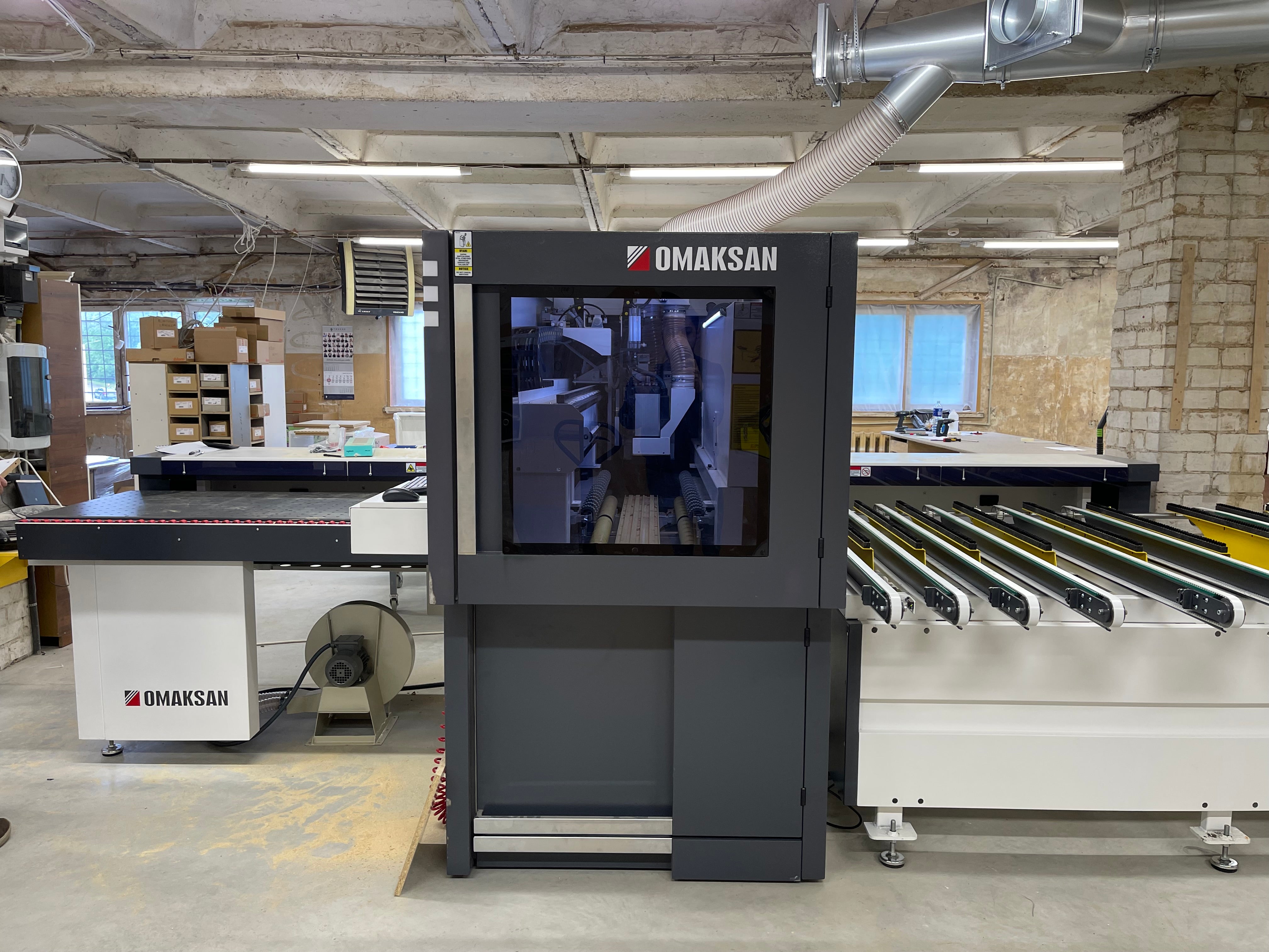 5 pusių CNC gręžimo centras su frezavimu